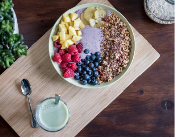 Top view of a bowl filled with different types of superfoods.