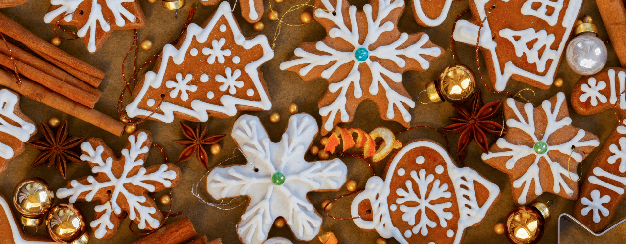 Assorted healthy chirstmas cookies on wood counter.