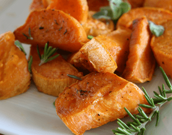 Delicious cubed sweet potatoes on a plate.